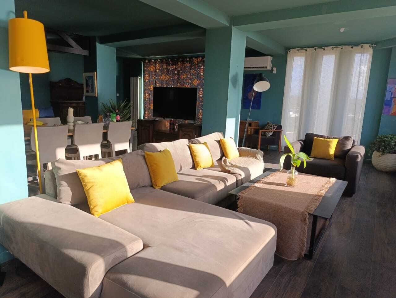 Comfort Apartment, Beach View | Living area | 40-inch flat-screen TV with digital channels