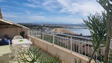 Comfort Apartment, Multiple Beds, Beach View | Terrace/patio