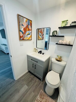 Shower, towels, toilet paper