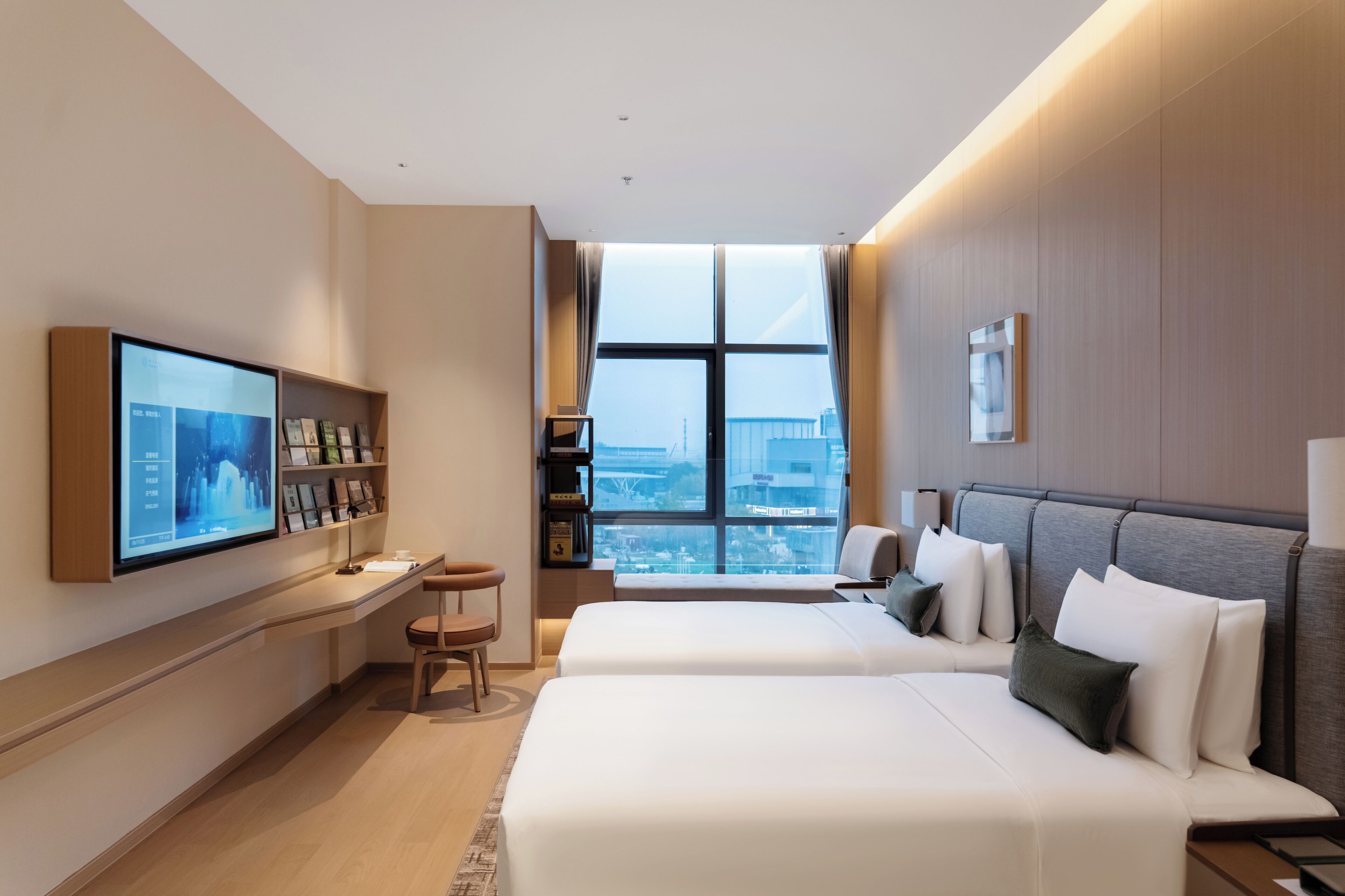 高級寝具、羽毛の掛け布団、ピロートップベッド、客室ごとに異なる装飾