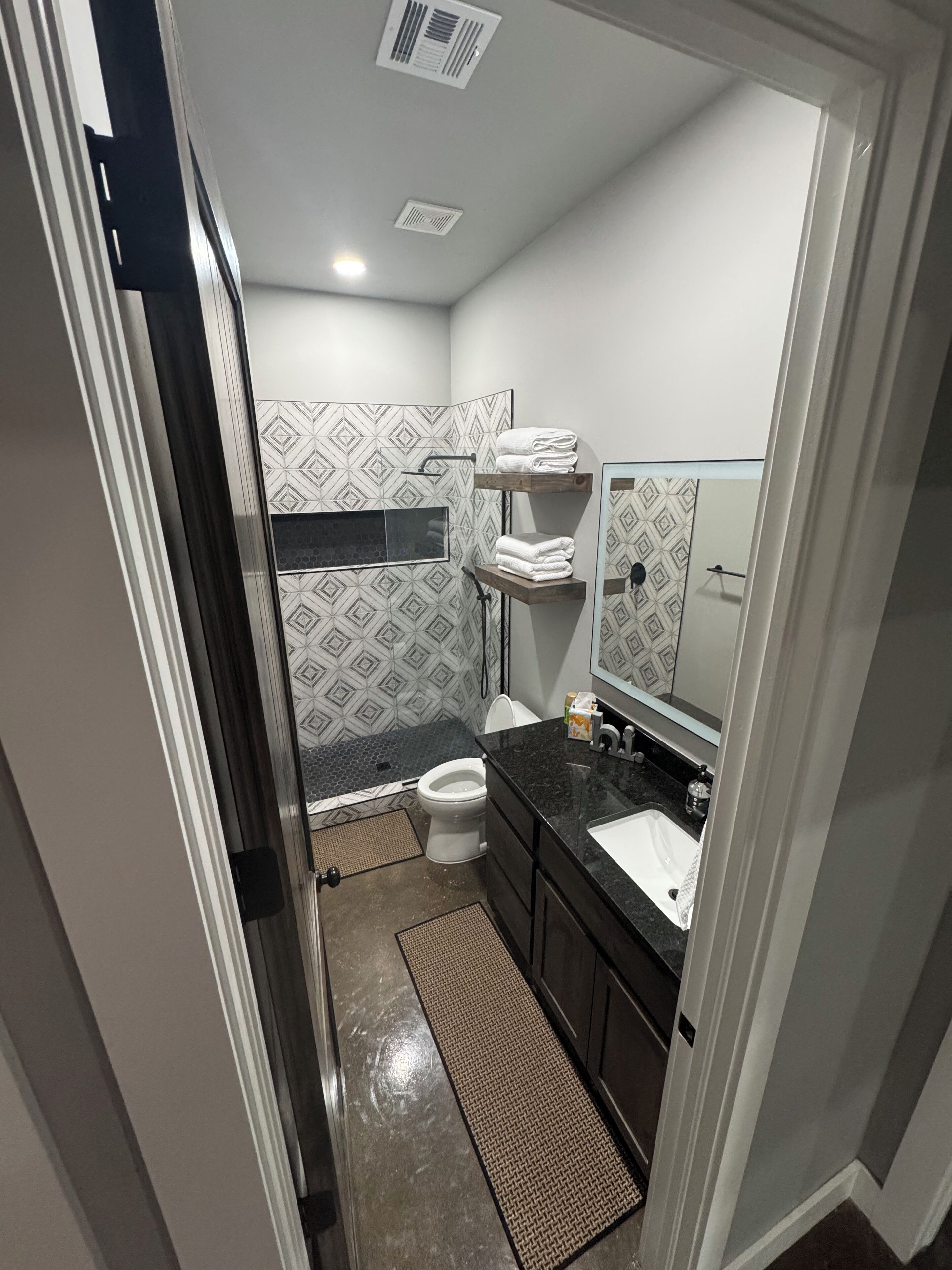 Shower, towels, soap, toilet paper