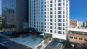 A modern hotel building with a grid of windows and a flat roof. - SL Hotel Myeongdong (Seoul)