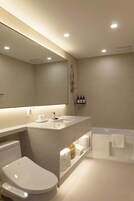 Suite, City View | Bathroom | Bathrobes, slippers