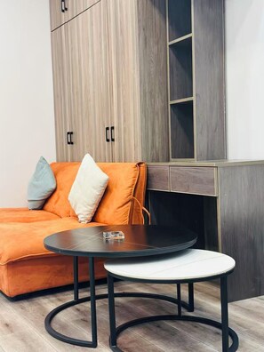 Comfort Twin Room | Living area | 30-inch TV with cable channels