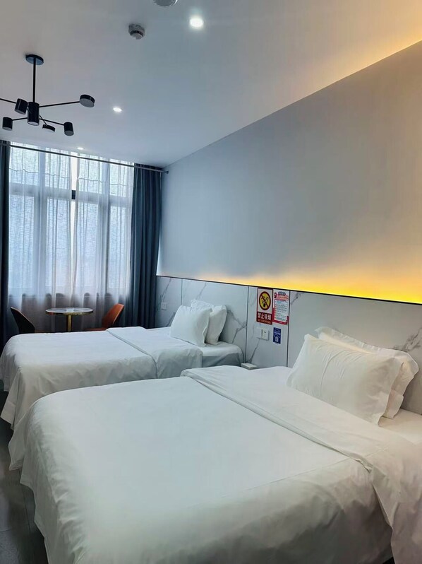 Chambre Affaires avec lits jumeaux | Rideaux occultants, Wi-Fi gratuit, draps fournis