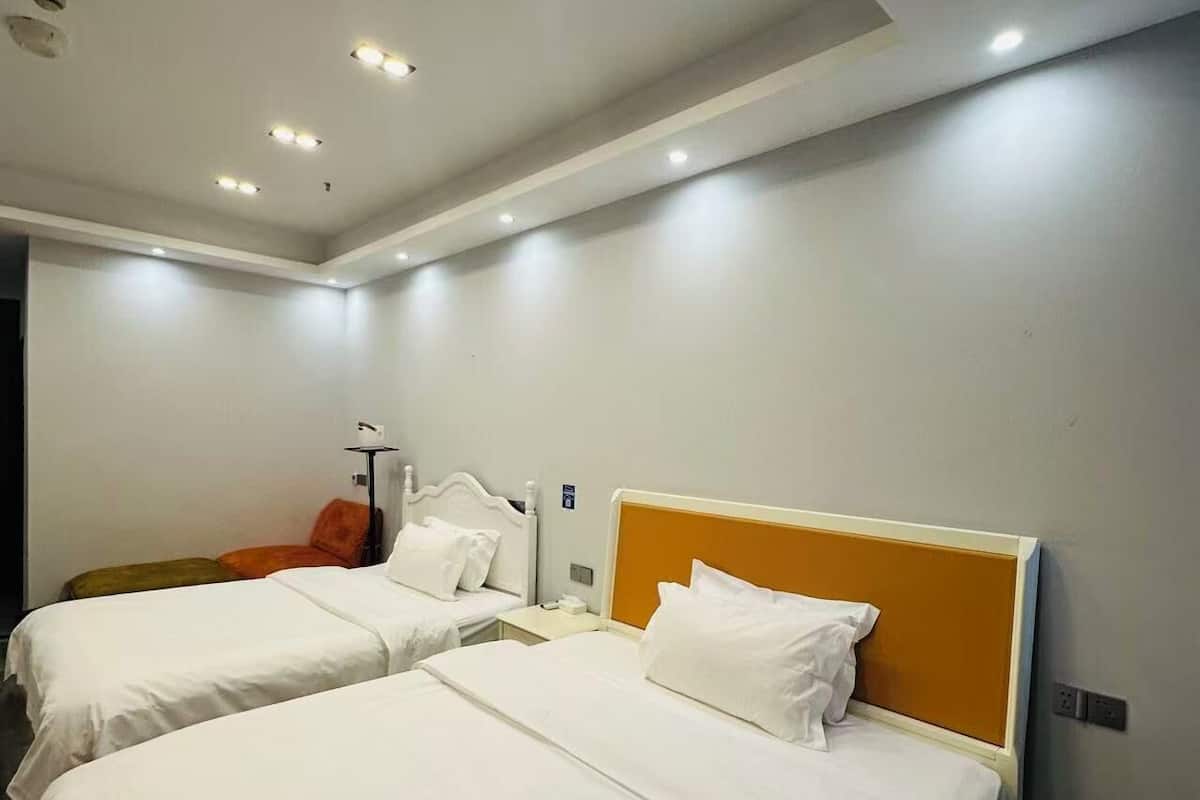 Kamar Twin Comfort | Tirai kedap cahaya, Wi-Fi gratis, dan seprai linen