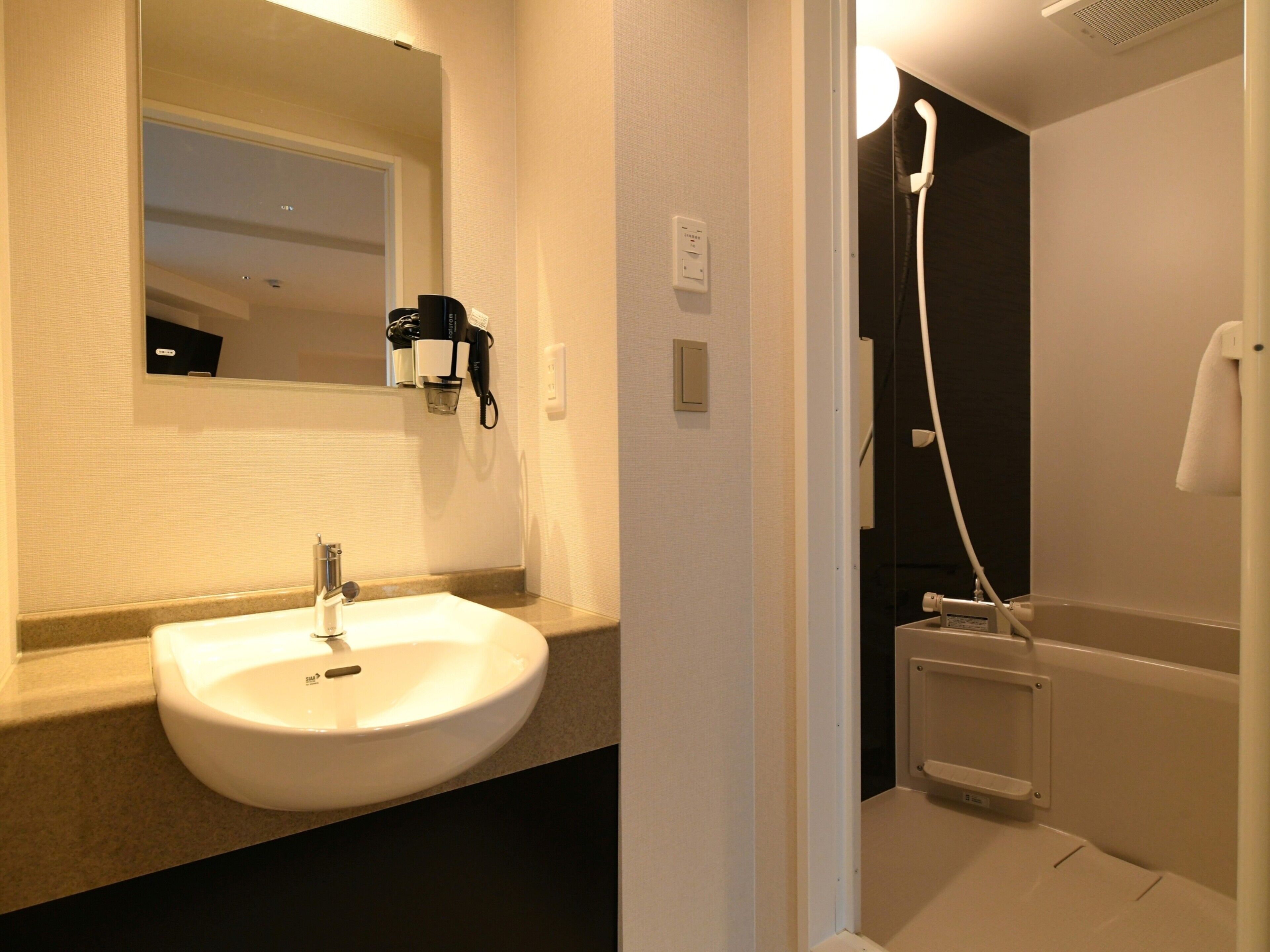 Triple Room, Non Smoking | Bathroom | Combined shower/tub, hair dryer, towels, soap