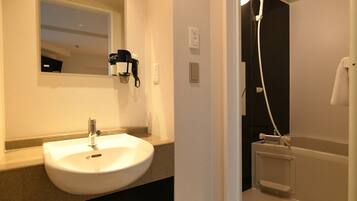 Triple Room, Non Smoking | Bathroom | Combined shower/tub, hair dryer, towels, soap