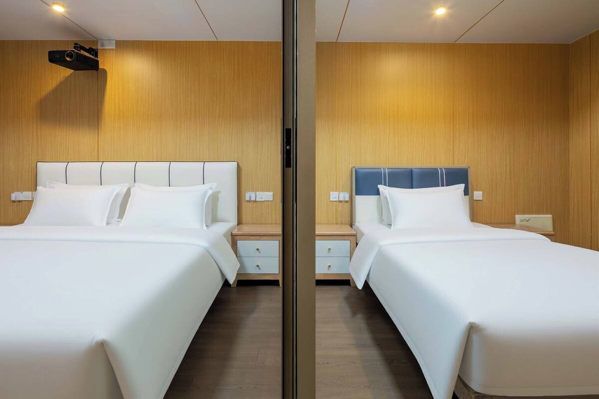Kamar Triple Deluks, pemandangan kota | Seprai premium dan didekorasi berbeda-beda