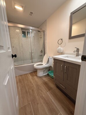 Hair dryer, towels, soap, toilet paper
