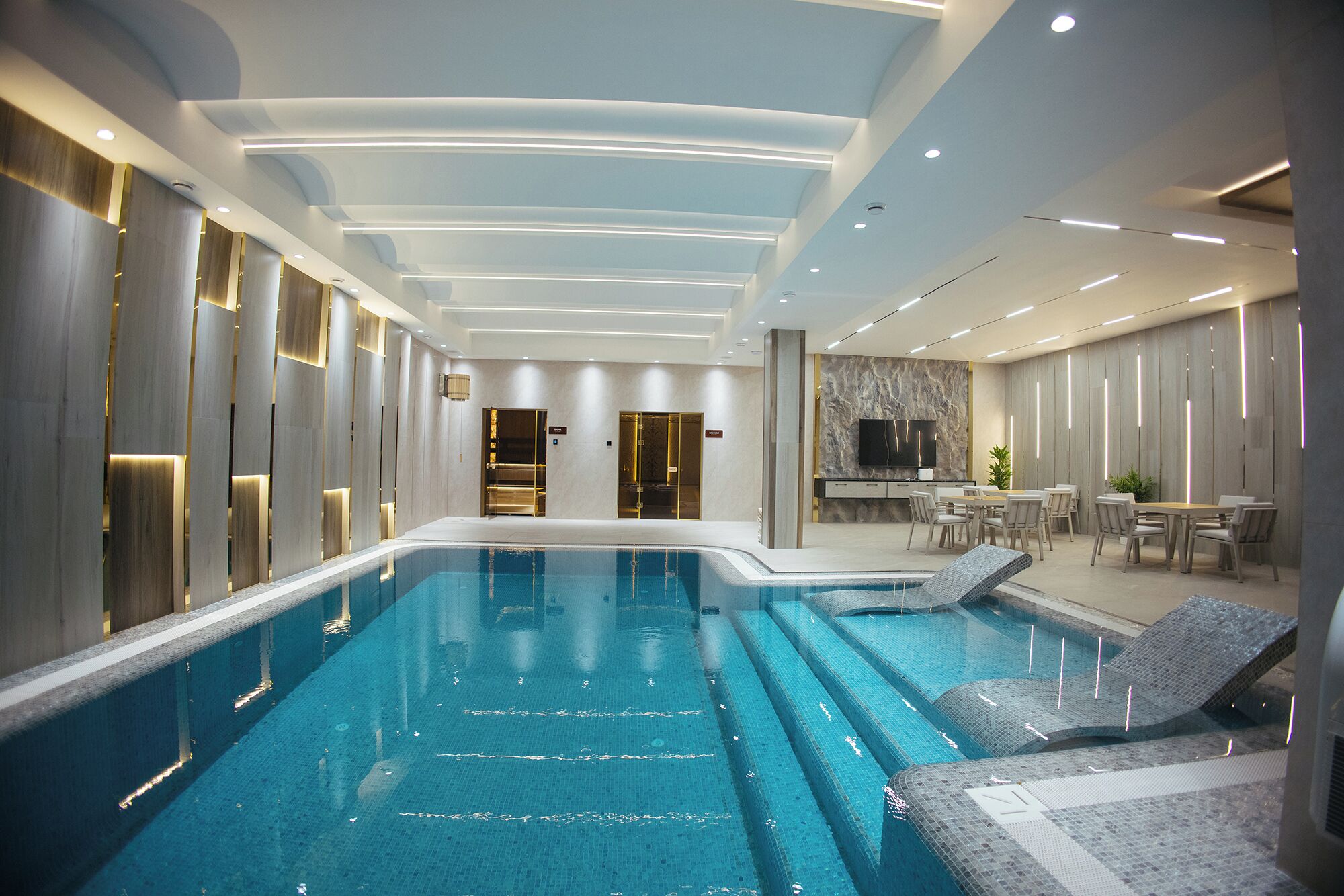 2 indoor pools, open 10:00 AM to 11:00 PM, pool loungers