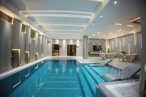 2 indoor pools, open 10:00 AM to 11:00 PM, pool loungers