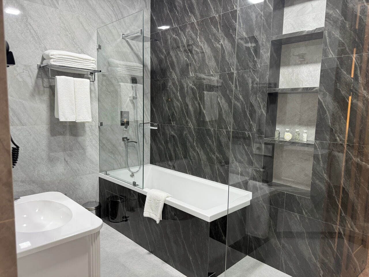 Hair dryer, slippers, towels, soap