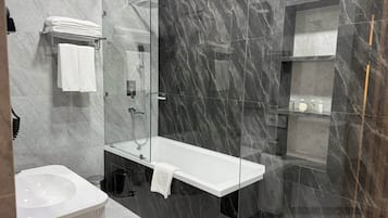 Hair dryer, slippers, towels, soap