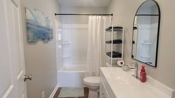 Hair dryer, towels, soap, toilet paper