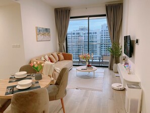 Royal Apartment, 2 Bedrooms, Balcony, Pool View | Living area | Flat-screen TV - Vinhomes Grand Park Serviced Apartment (Ho Chi Minh City)