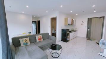 Superior Apartment, 2 Bedrooms, Balcony, City View | Living area | Flat-screen TV