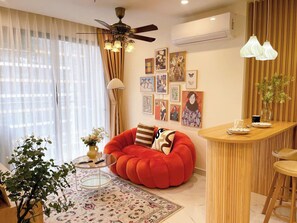 Luxury Apartment, 1 Bedroom, Balcony, Pool View | Living area | Flat-screen TV - Vinhomes Grand Park Serviced Apartment (Ho Chi Minh City)