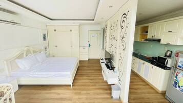 Deluxe Apartment, 1 King Bed, Balcony, City View | In-room safe, desk, laptop workspace, soundproofing