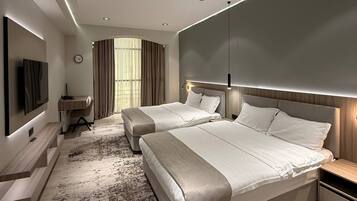 Luxury Twin Room, 1 Bedroom, City View | In-room safe, desk, laptop workspace, blackout curtains