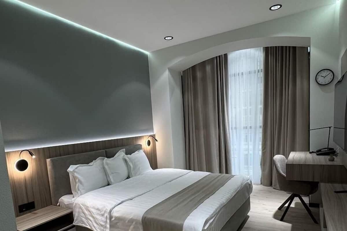 Suite, Stadtblick | Zimmersafe, Verdunkelungsvorhänge, Bügeleisen/Bügelbrett