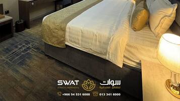 Caja fuerte, tabla de planchar con plancha, wifi gratis