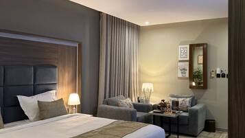 Double Room | Pillow-top beds, minibar, in-room safe, iron/ironing board