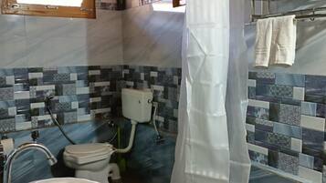 Deluxe Room, Mountain View | Bathroom | Shower, free toiletries, towels, soap