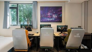 Classic Triple Room, Courtyard View | Desk, laptop workspace, blackout drapes, soundproofing