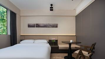 Elite Double Room, Garden View | Desk, laptop workspace, blackout drapes, soundproofing