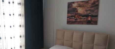 4 habitaciones, tabla de planchar con plancha, wifi y ropa de cama