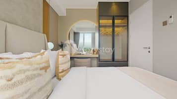 Apartment, 2 Bedrooms, City View | Desk, laptop workspace, iron/ironing board, free WiFi