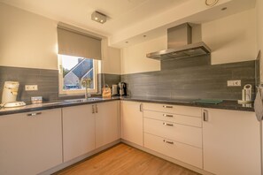 House | Private kitchen | High chair - Charming Villa Near the sea and Forest (De Koog)