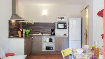 Fridge, microwave, high chair