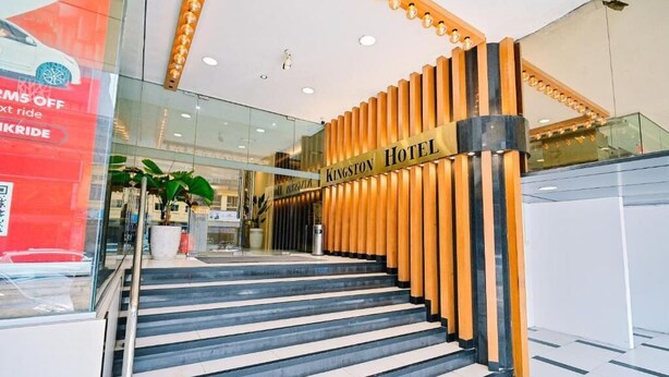 A hotel entrance with a staircase leading up to a reception area. - Kingston Hotel 5 at Chow Kit (Kuala Lumpur)