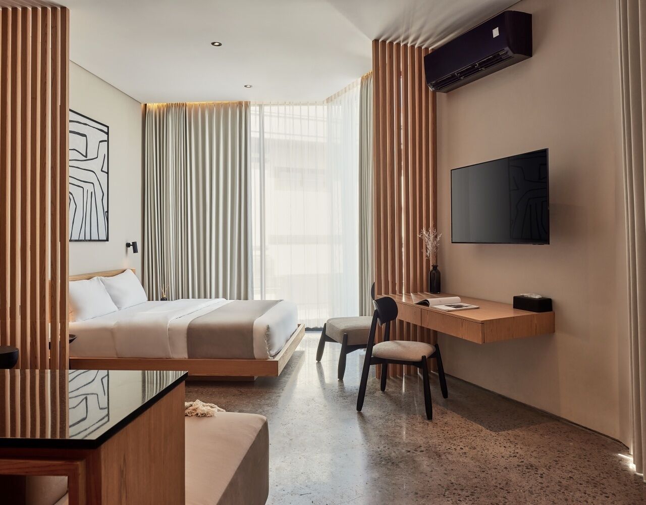 Premium bedding, desk, laptop workspace, iron/ironing board