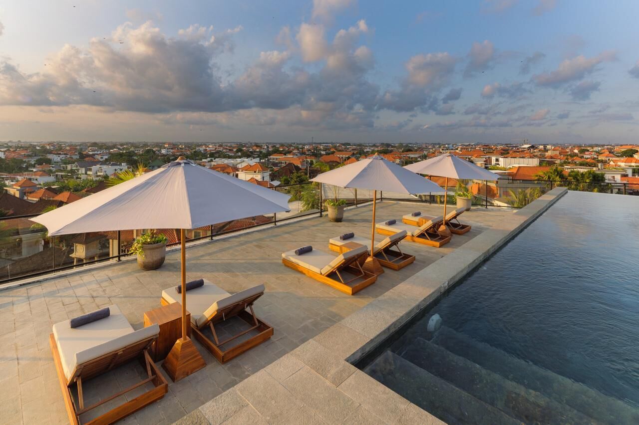 Outdoor pool, open 8:00 AM to 8:00 PM, pool umbrellas, sun loungers