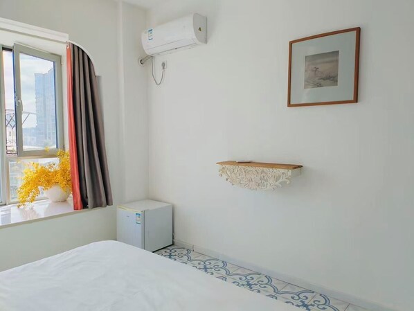 Habitación básica, vistas a la ciudad | Wifi gratis