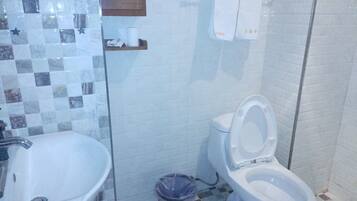 Basic Room, City View | Bathroom | Free toiletries, hair dryer, towels, soap