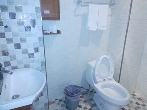 Basic Room, City View | Bathroom | Free toiletries, hair dryer, towels, soap