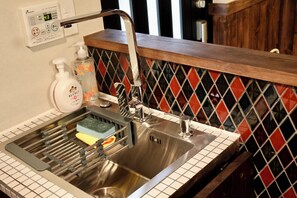 Classic Quadruple Room | Private kitchen