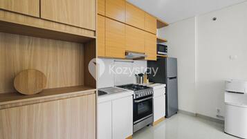 Apartment, 2 Bedrooms, Garden View | Private kitchen | Full-sized fridge, microwave, stovetop