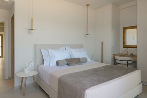 2 chambres, coffres-forts dans les chambres, fer et planche à repasser