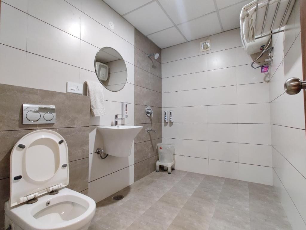 Shower, free toiletries, towels, soap