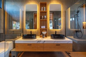 Shower, hair dryer, towels, soap