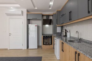 Grand Apartment, 2 Bedrooms | Private kitchen | Full-size fridge, oven, stovetop, dishwasher - Moon Old Town (Antalya)
