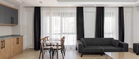 Grand Apartment, 2 Bedrooms | Living area | 43-inch TV with satellite channels, Netflix, streaming services