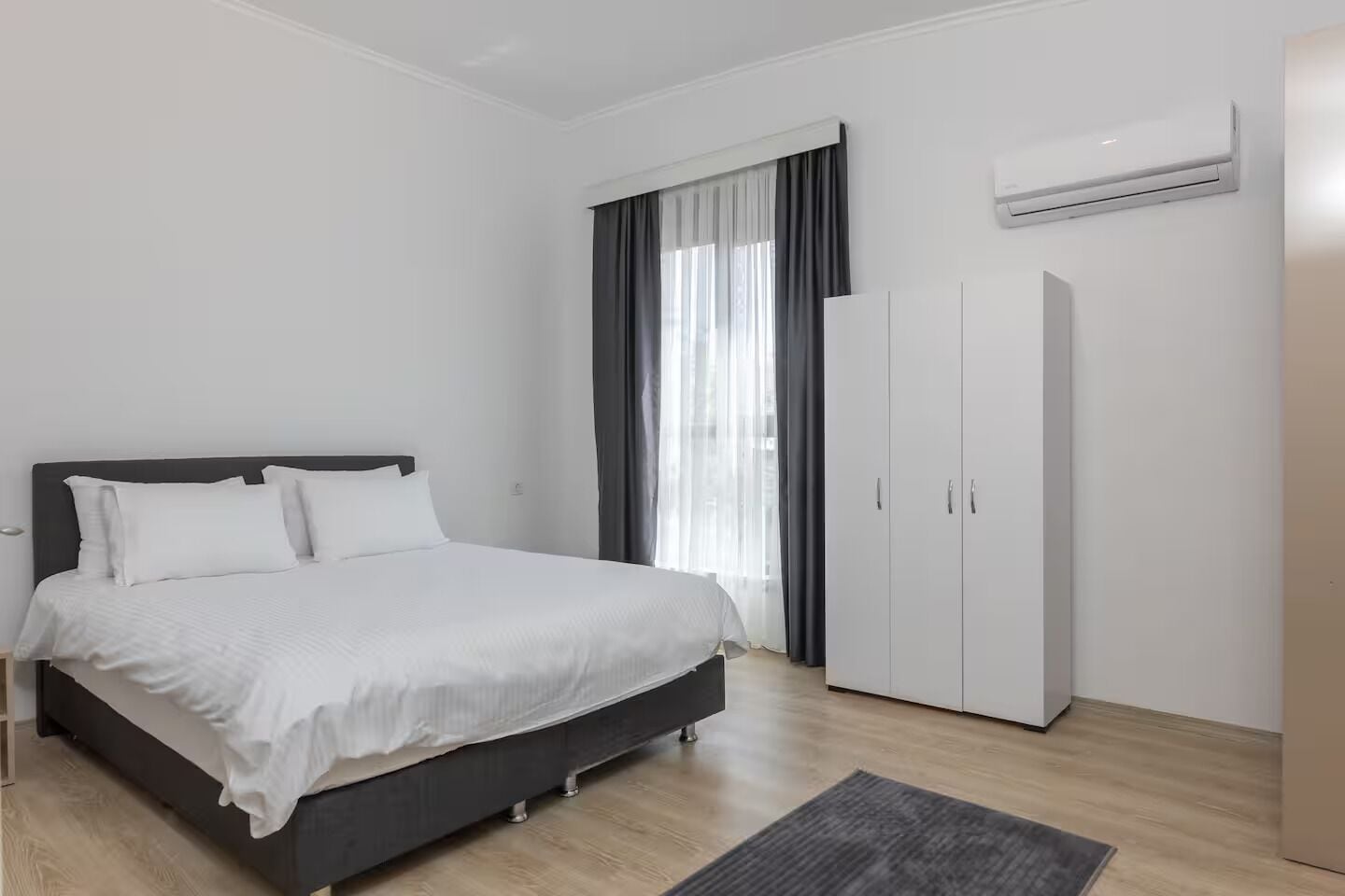 Standard Apartment | Desk, laptop workspace, blackout drapes, soundproofing