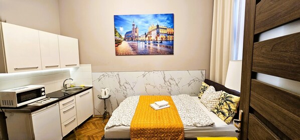 1 chambre, fer et planche à repasser, Wi-Fi gratuit, draps fournis