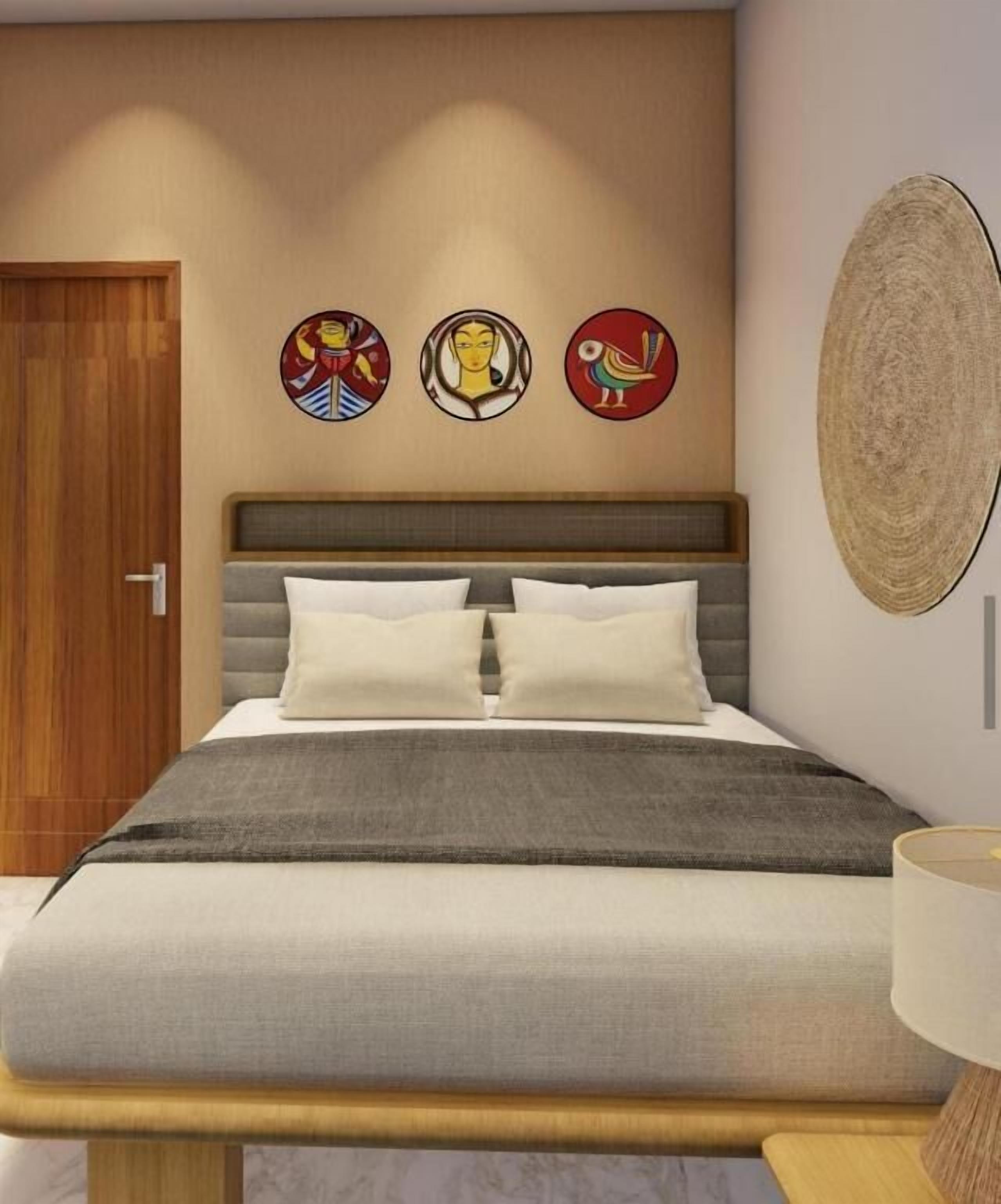 Espacio para trabajar con laptop y tabla de planchar con plancha 